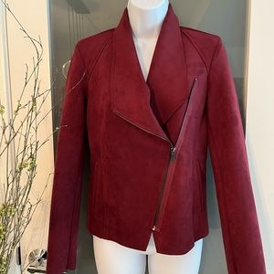 Ultra suede burgundy moto jacket with asymmetrical zipper with side pockets.